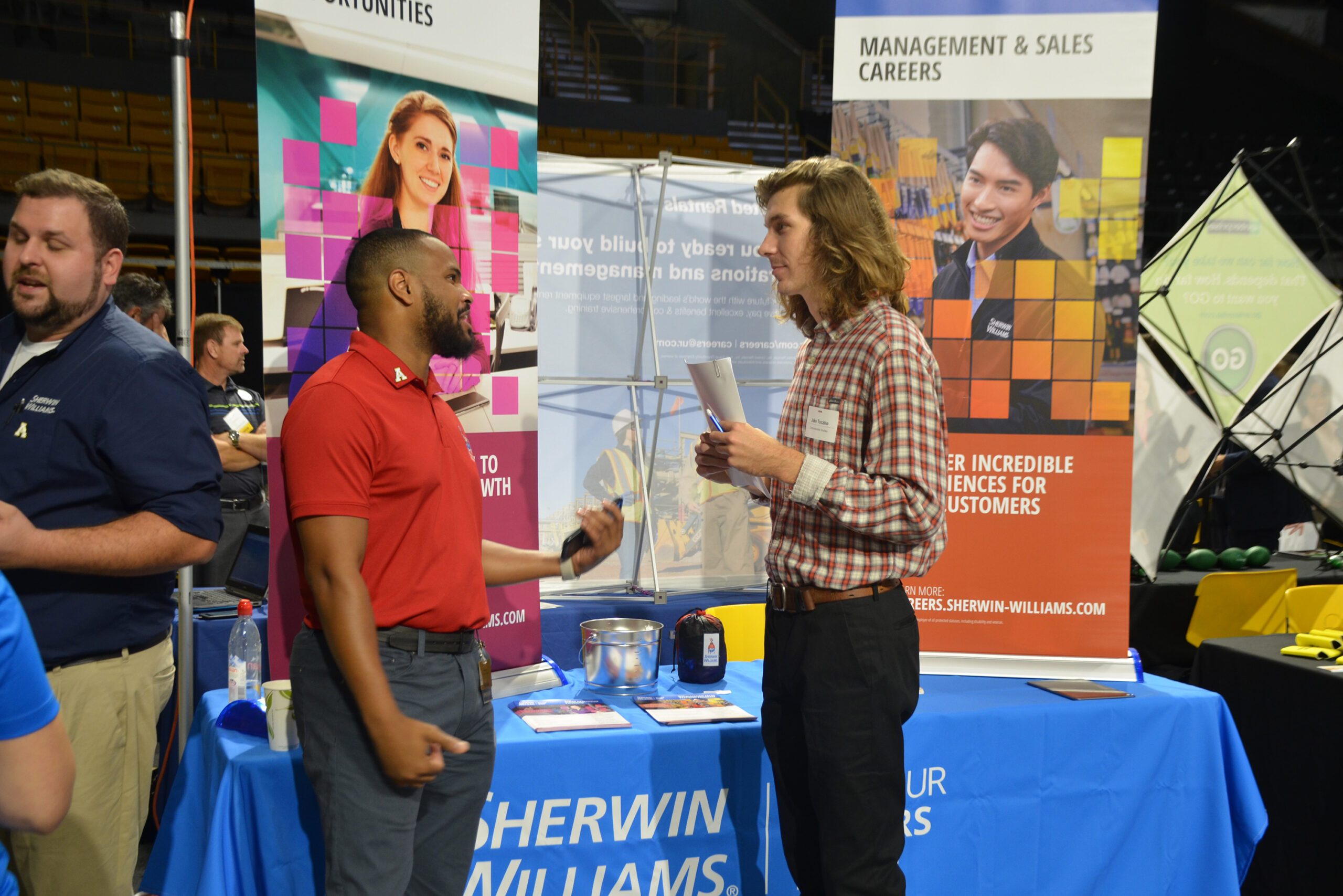 Student talking with employer
